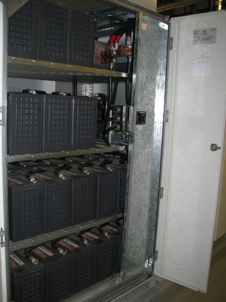 UPS battery cabinet with its door open