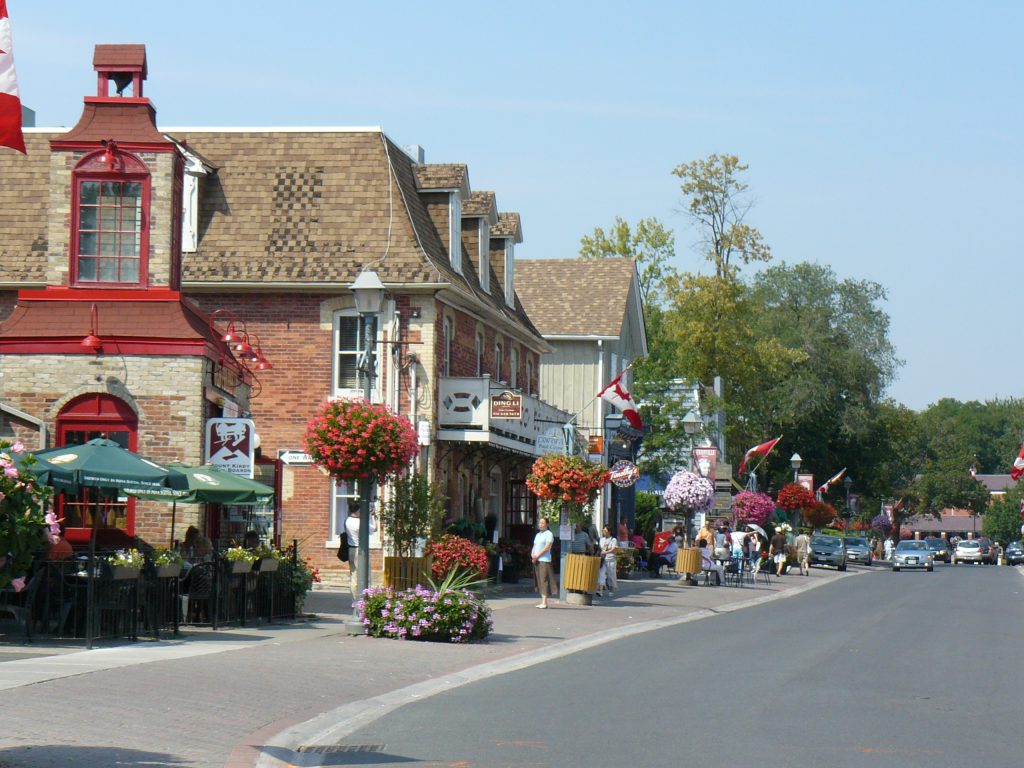 Shops with hanging flower baskets along Main Street in Unionville, Markham, Ontario